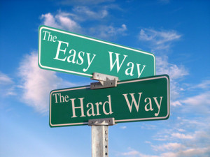 sign that reads "easy way, hard way"